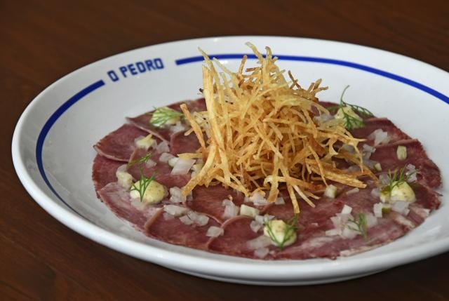 We could only taste the fat in the tongue prosciutto, which is also overwhelmed by the tartness of the mayonnaise topping. (Shashi S Kashyap / HT Photo)