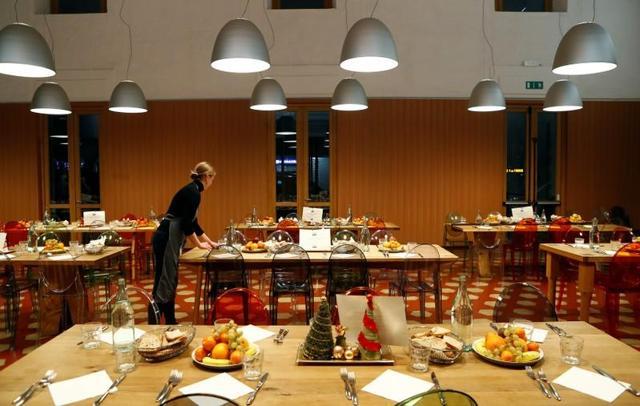 Refettorio Ambrosiano feeds the poor, many of them homeless. (Reuters)