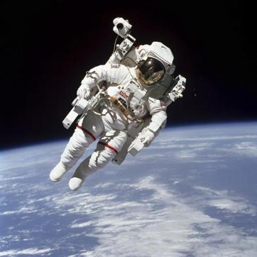 This February 7, 1984 photo made available by NASA shows astronaut Bruce McCandless II, participating in a spacewalk a few meters away from the cabin of the Earth-orbiting space shuttle Challenger, using a nitrogen-propelled Manned Maneuvering Unit. (AP Photo) This February 7, 1984 photo made available by NASA shows astronaut Bruce McCandless II, participating in a spacewalk a few meters away from the cabin of the Earth-orbiting space shuttle Challenger, using a nitrogen-propelled Manned Maneuvering Unit. (AP Photo)