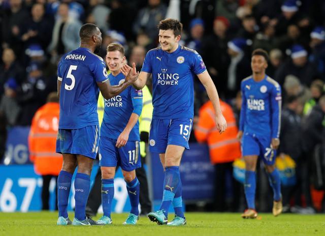 Leicester City's Harry Maguire celebrates after the match with Wes Morgan. (REUTERS) Leicester City's Harry Maguire celebrates after the match with Wes Morgan. (REUTERS)