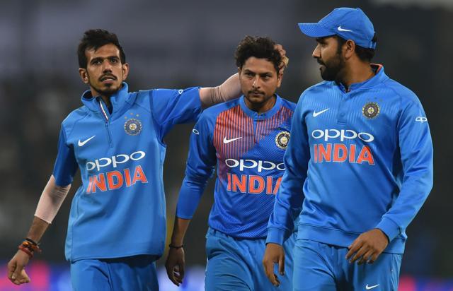 Yuzvendra Chahal (extreme left) celebrates a Sri Lankan wicket with teammate Kuldeep Yadav as captain Rohit Sharma looks on during the second T20 international cricket match at the Holkar Stadium in Indore on December 22, 2017. (AFP) Yuzvendra Chahal (extreme left) celebrates a Sri Lankan wicket with teammate Kuldeep Yadav as captain Rohit Sharma looks on during the second T20 international cricket match at the Holkar Stadium in Indore on December 22, 2017. (AFP)