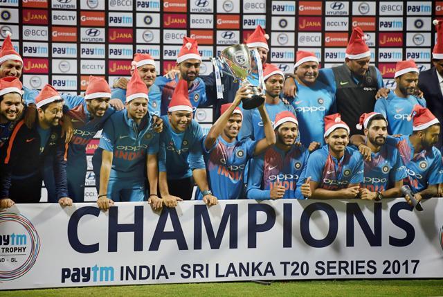 Indian cricket team players pose for a photo with the trophy after winning the T20 series against Sri Lanka at Wankhede Stadium in Mumbai, on December 25, 2017. (PTI) Indian cricket team players pose for a photo with the trophy after winning the T20 series against Sri Lanka at Wankhede Stadium in Mumbai, on December 25, 2017. (PTI)