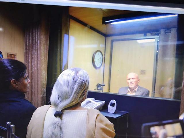 Former Indian Navy officer Kulbhushan Jadhav's wife and mother meet him in Islamabad on Monday. PTI Photo / Twitter@foreignofficepk Former Indian Navy officer Kulbhushan Jadhav's wife and mother meet him in Islamabad on Monday. PTI Photo / Twitter@foreignofficepk