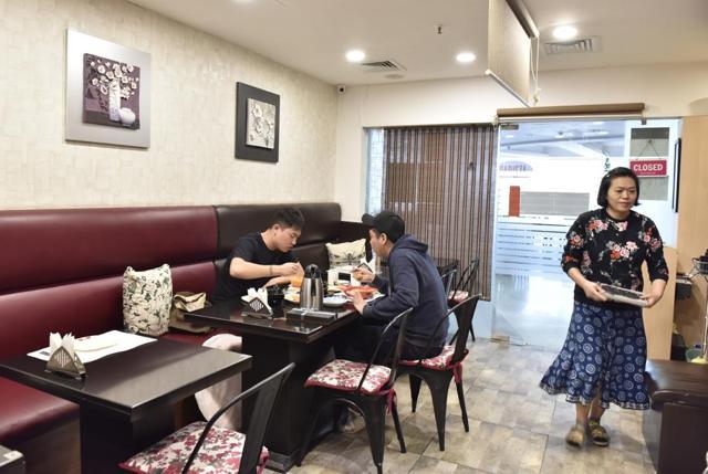 Korean family Jin Ho Park and In A Lee with their sons, Joo Won and Joo Hwan in Gurgaon. (Sanjeev Verma/HT Photo)