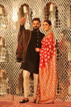 Virat Kohli and Anushka Sharma at their wedding reception in Delhi’s Taj Diplomatic Enclave, where air purifiers protected VIP lungs from foul air. (Photo: Manoj Verma/HT)