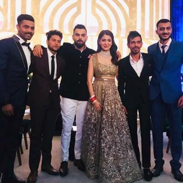 Kuldeep Yadav, Yuzvendra Chahal, Axar Patel and Ravindra Jadeja pose with Virat Kohli and Anushka Sharma. (Twitter) Kuldeep Yadav, Yuzvendra Chahal, Axar Patel and Ravindra Jadeja pose with Virat Kohli and Anushka Sharma. (Twitter)