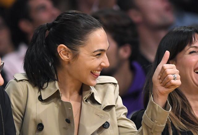 Actor Gal Gadot gestures during the second half of an NBA basketball game between the Los Angeles Lakers and the Los Angeles Clippers. (AP) Actor Gal Gadot gestures during the second half of an NBA basketball game between the Los Angeles Lakers and the Los Angeles Clippers. (AP)