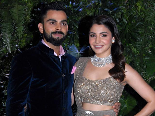 Indian cricketer Virat Kohli (L) and his wife Bollywood actress Anushka Sharma pose during their wedding reception in Mumbai. (AFP) Indian cricketer Virat Kohli (L) and his wife Bollywood actress Anushka Sharma pose during their wedding reception in Mumbai. (AFP)