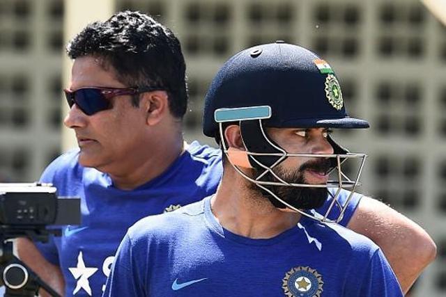 Virat Kohli (R) and Indian team head coach Anil Kumble hardly interacted during the ICC Champions Trophy. India lost in the final vs Pakistan. (AFP/Getty Images) Virat Kohli (R) and Indian team head coach Anil Kumble hardly interacted during the ICC Champions Trophy. India lost in the final vs Pakistan. (AFP/Getty Images)
