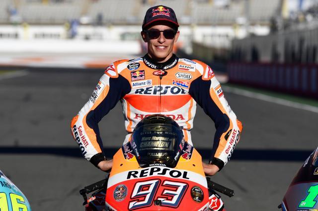 World Champion rider Marc Marquez poses after Valencia Grand Prix MotoGP race. (AFP) World Champion rider Marc Marquez poses after Valencia Grand Prix MotoGP race. (AFP)