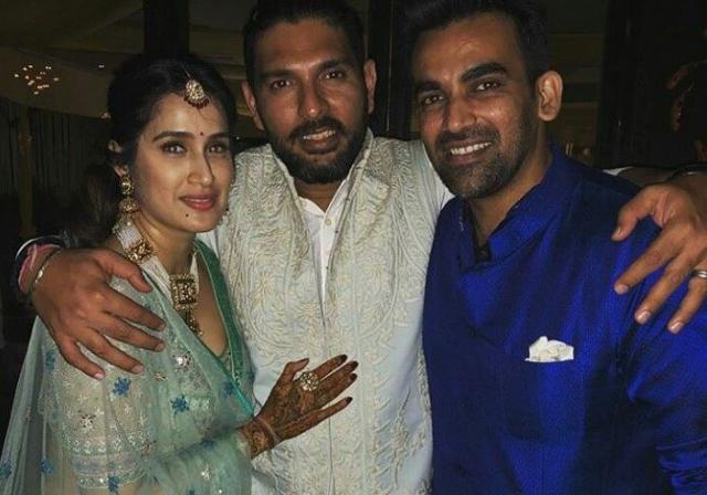 Zaheer and Sagarika with Youvraj Singh at their mehendi function.