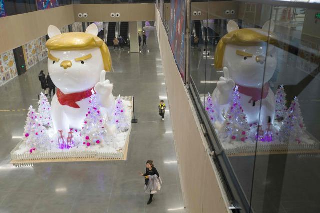 A statue of a dog, with a resemblance to US President Donald Trump, is seen in a shopping mall in Taiyuan, in China's northern Shanxi province on December 29, 2017. (AFP) A statue of a dog, with a resemblance to US President Donald Trump, is seen in a shopping mall in Taiyuan, in China's northern Shanxi province on December 29, 2017. (AFP)