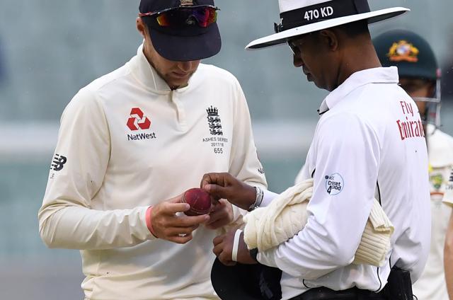Joe Root and umpire Kumar Dharmasena inspect the ball on the fourth day of the Ashes Test in Melbourne (AFP) Joe Root and umpire Kumar Dharmasena inspect the ball on the fourth day of the Ashes Test in Melbourne (AFP)