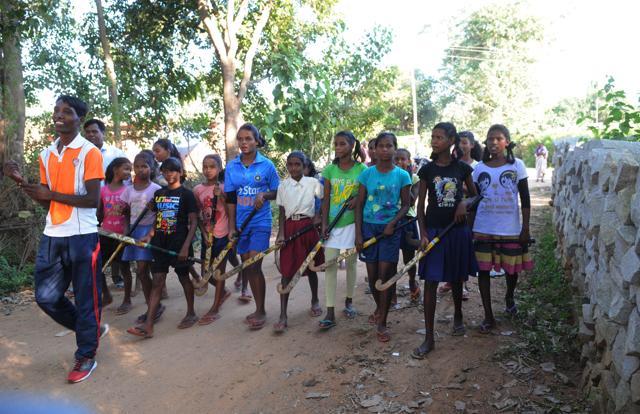 Hockey enthusiasts from Hesal village on their way to play a village-level hockey match in Khunti in Jharkhand. (Diwakar Prasad/ HT Photo) Hockey enthusiasts from Hesal village on their way to play a village-level hockey match in Khunti in Jharkhand. (Diwakar Prasad/ HT Photo)