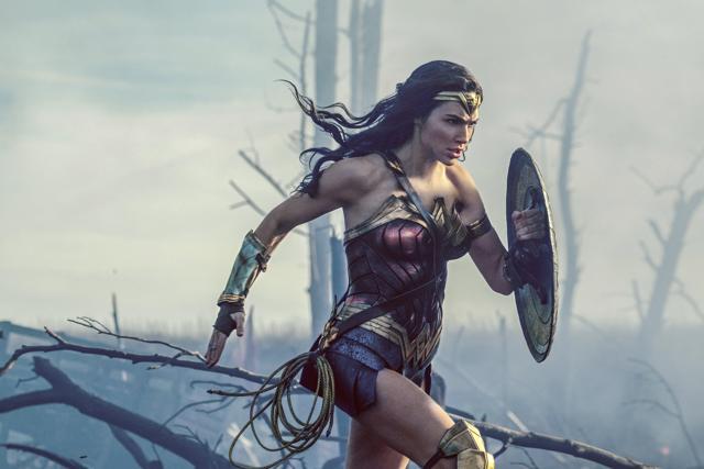This image released by Warner Bros. Entertainment shows Gal Gadot charging through No Man’s Land during a WWI battle scene from Wonder Woman. (AP) This image released by Warner Bros. Entertainment shows Gal Gadot charging through No Man’s Land during a WWI battle scene from Wonder Woman. (AP)