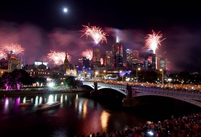 Fireworks light up the sky from building rooftops along the Yarra River during New Year 2018 celebrations in Melbourne early on January 1, 2018. (AFP) Fireworks light up the sky from building rooftops along the Yarra River during New Year 2018 celebrations in Melbourne early on January 1, 2018. (AFP)