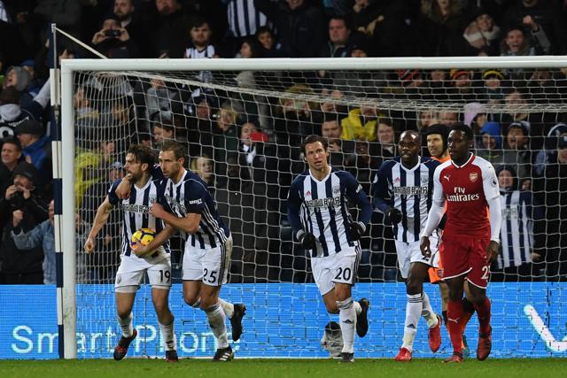 West Bromwich Albion's English striker Jay Rodriguez ) celebrates with teammates after scoring against Arsenal. (AFP) West Bromwich Albion's English striker Jay Rodriguez ) celebrates with teammates after scoring against Arsenal. (AFP)