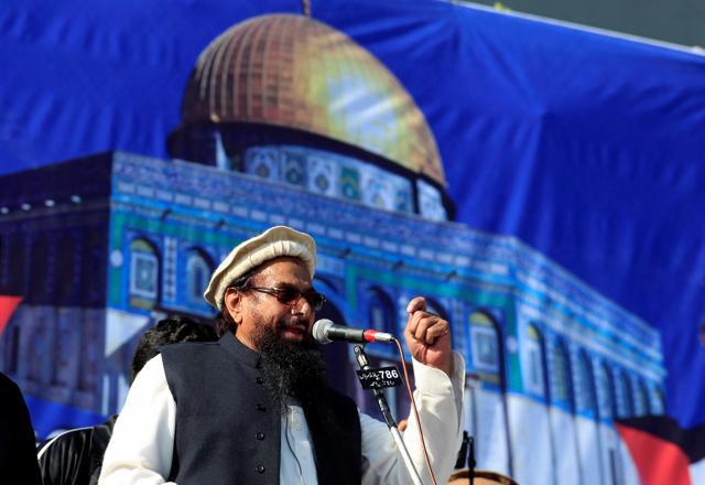 Hafiz Muhammad Saeed (C) at the Rawalpindi rally. (REUTERS) Hafiz Muhammad Saeed (C) at the Rawalpindi rally. (REUTERS)