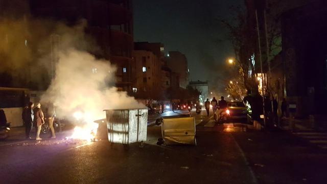 People protest in Tehran on December 30, 2017 in this picture obtained from social media. (REUTERS) People protest in Tehran on December 30, 2017 in this picture obtained from social media. (REUTERS)
