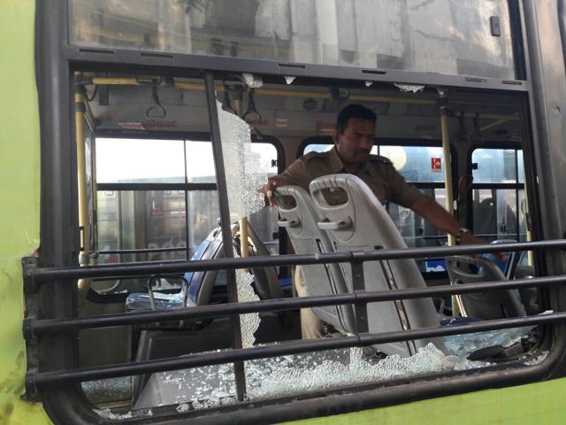 A vandalised TMT bus in Thane. Seven buses were reportedly damaged in the city by Tuesday evening. (Praful Gangurde/HT Photo) A vandalised TMT bus in Thane. Seven buses were reportedly damaged in the city by Tuesday evening. (Praful Gangurde/HT Photo)