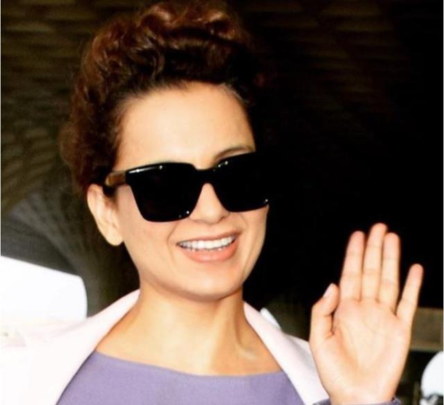 Kangana wore her signature curly hair in an updo, black oversized sunglasses and barely-there make-up. (Instagram) Kangana wore her signature curly hair in an updo, black oversized sunglasses and barely-there make-up. (Instagram)