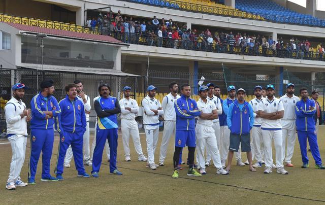 Delhi players during the presentation ceremony of the Ranji Trophy final cricket match against Vidarbha in Indore on Monday. (PTI) Delhi players during the presentation ceremony of the Ranji Trophy final cricket match against Vidarbha in Indore on Monday. (PTI)
