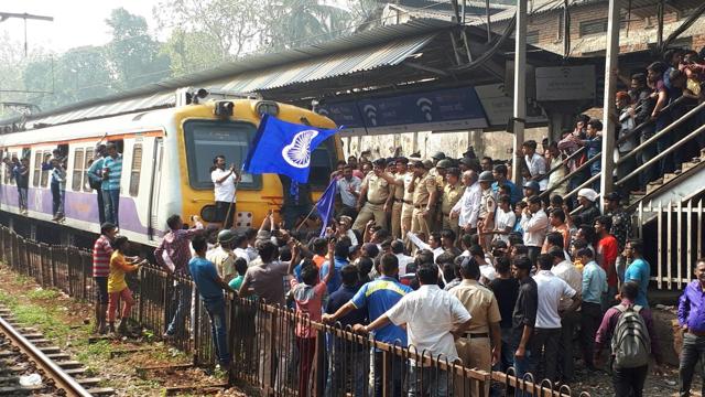 Protesters block trains on platform no. 2 on the central line at Dadar station. (Bhushan Koyande/HT) Protesters block trains on platform no. 2 on the central line at Dadar station. (Bhushan Koyande/HT)