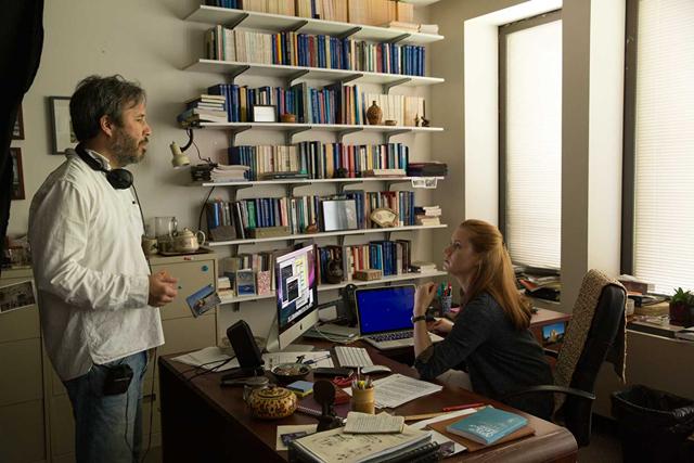 Denis Villeneuve on the sets of Arrival with Amy Adams. Denis Villeneuve on the sets of Arrival with Amy Adams.