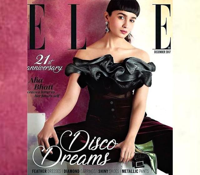 Alia Bhatt wore her metallic top with high-waist velvet pants in deep red. (Instagram/ Elle India)