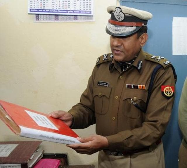 JN Singh examining police records at the station. (HT Photo) JN Singh examining police records at the station. (HT Photo)