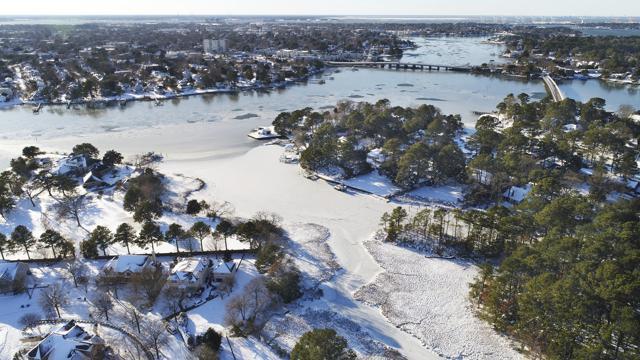 In this aerial photo, the Lafayette Shores neighborhood in Norfolk, Va., is blanketed in snow Friday, Jan. 5, 2018. (AP) In this aerial photo, the Lafayette Shores neighborhood in Norfolk, Va., is blanketed in snow Friday, Jan. 5, 2018. (AP)