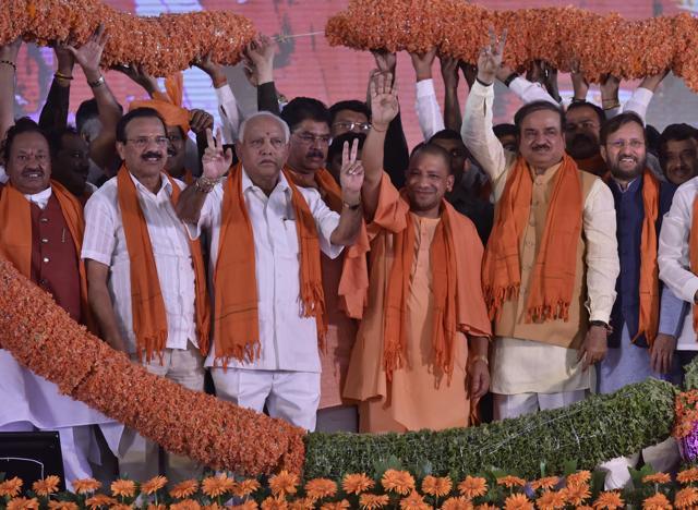 Karnataka state president of BJP, B S Yeddyurappa (C) with Uttar Pradesh chief minister Yogi Adityanath (2R) , Union minister Ananth Kumar (R), Sadanand Gowda (L) during Parivartana rally in Bengaluru on Sunday. (Arijit Sen/HT Photo) Karnataka state president of BJP, B S Yeddyurappa (C) with Uttar Pradesh chief minister Yogi Adityanath (2R) , Union minister Ananth Kumar (R), Sadanand Gowda (L) during Parivartana rally in Bengaluru on Sunday. (Arijit Sen/HT Photo)