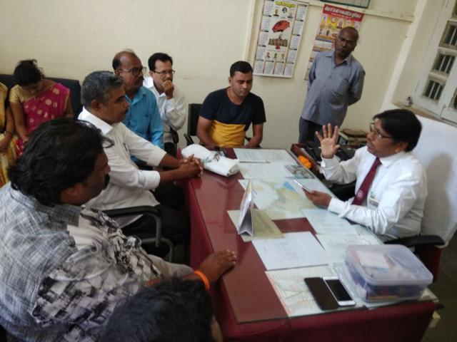 Members of the Dahanu Vaitarna Pravasi Sevabhavi Sanstha lodge a complaint with the station manager at Palghar station. Members of the Dahanu Vaitarna Pravasi Sevabhavi Sanstha lodge a complaint with the station manager at Palghar station.