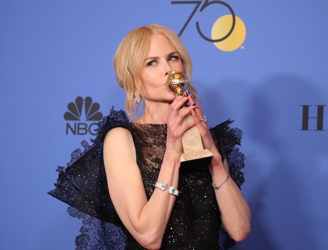 Nicole Kidman poses with her award for Best Performance by an Actress in a Limited Series or Motion Picture Made for Television for her role in Big Little Lies. (REUTERS)