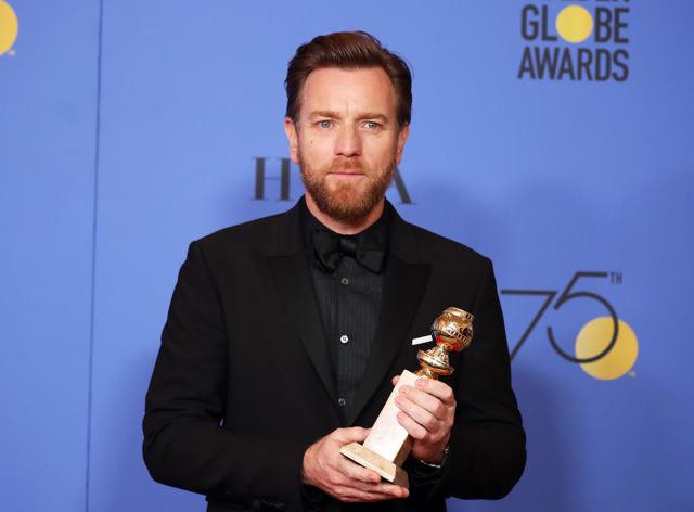 Ewan McGregor poses with the award for Best Performance by an Actor in a Supporting Role in a Limited Series or Motion Picture made for Television for Fargo. (REUTERS)