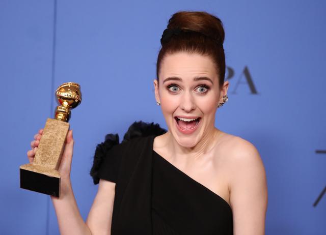 Rachel Brosnahan poses backstage with her award for Best Actress in a Television Series, Comedy or Musical for the Amazon series The Marvelous Mrs. Maisel. (REUTERS)
