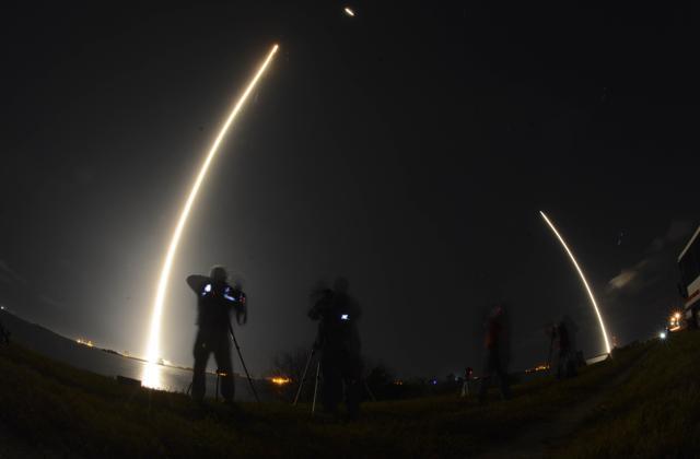In this image made with a long exposure the SpaceX Falcon 9 rocket launches from Cape Canaveral Air Force Station. (AP Photo)