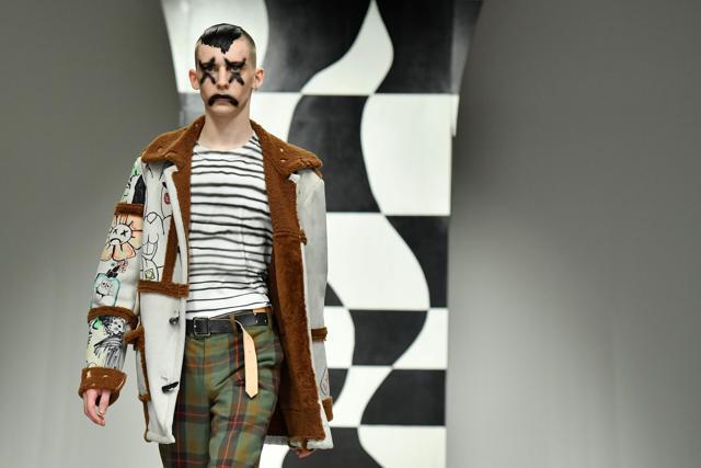 A model presents a creation from the Liam Hodges collection during a catwalk show on the second day of the Autumn/Winter 2018 London Fashion Week Men's, in London on January 6, 2018. (AFP) A model presents a creation from the Liam Hodges collection during a catwalk show on the second day of the Autumn/Winter 2018 London Fashion Week Men's, in London on January 6, 2018. (AFP)