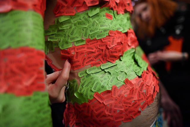 A shirt being crafted with price tags at the Autumn/Winter 2018 London Fashion Week Men's. (AFP) A shirt being crafted with price tags at the Autumn/Winter 2018 London Fashion Week Men's. (AFP)