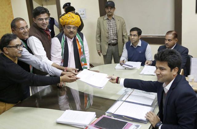 Congress candidate Raghu Sharma files nomination with Rajasthan Congress chief Sachin Pilot and other leaders in Ajmer on Wednesday. (Deepak Sharma/HT ) Congress candidate Raghu Sharma files nomination with Rajasthan Congress chief Sachin Pilot and other leaders in Ajmer on Wednesday. (Deepak Sharma/HT )