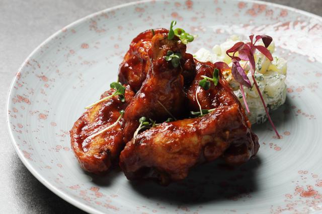 Whatever we tried at the restaurant, including the BBQ Chicken Wings with Potato Salad (Rs350) pictured above, was done just right.