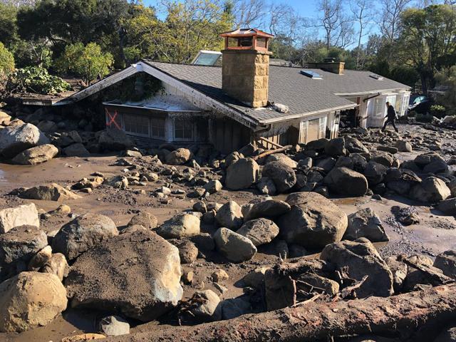 A damaged house is surrounded by large boulders and debris following mudslides due to heavy rains in Montecito, California, U.S. in this photo provided by the Santa Barbara County Fire Department, January 10, 2018. (REUTERS) A damaged house is surrounded by large boulders and debris following mudslides due to heavy rains in Montecito, California, U.S. in this photo provided by the Santa Barbara County Fire Department, January 10, 2018. (REUTERS)