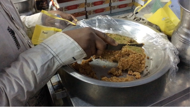 Elsewhere, milk cake is usually thick and hard. At the Hemraj Ladli Prasad shop in Chandni Chowk, because it is freshly prepared every day, it is moist and crumbly. (HT Photo) Elsewhere, milk cake is usually thick and hard. At the Hemraj Ladli Prasad shop in Chandni Chowk, because it is freshly prepared every day, it is moist and crumbly. (HT Photo)