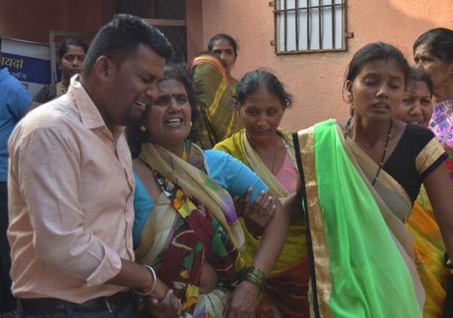 Parents of some of the girls who died when a boat carrying 40 students for a picnic capsized off the coast of Dahanu on Saturday. (Mangesh Lade / HT Photo) Parents of some of the girls who died when a boat carrying 40 students for a picnic capsized off the coast of Dahanu on Saturday. (Mangesh Lade / HT Photo)