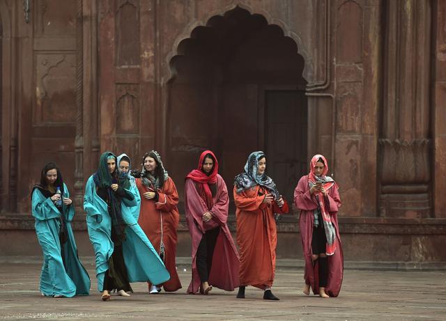 Foreign tourists visit the Jama Masjid mosque in New Delhi. (AFP) Foreign tourists visit the Jama Masjid mosque in New Delhi. (AFP)