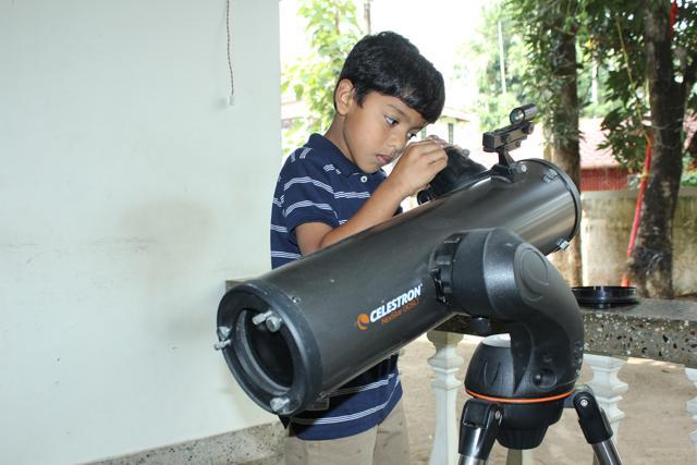 Sarang Sumesh, a 9-year-old from Kochi, has developed a special walking stick for the visually impaired, robotic tricycle and a special digital clock. (HT Photo)