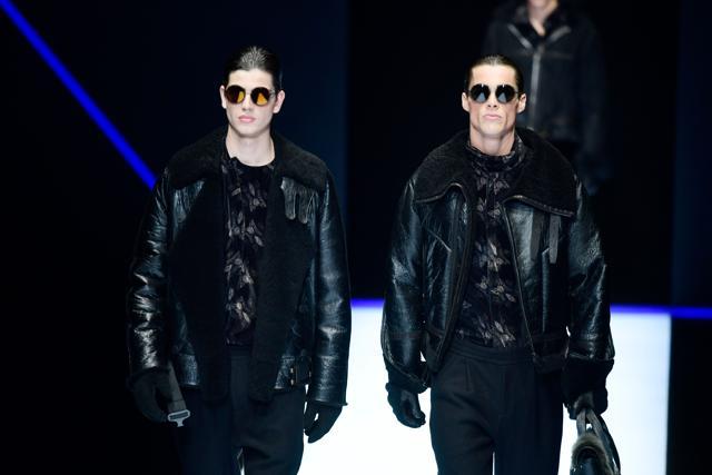 Models present creations for fashion house Emporio Armani during the Men's Fall/Winter 2019 fashion shows in Milan. (AFP/Miguel MEDINA)