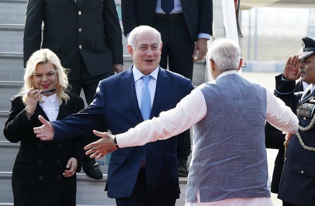Prime Minister Narendra Modi welcomes Israeli Prime Minister Benjamin Netanyahu and his wife Sara Netanyahu on their arrival at the Palam airport in New Delhi on Sunday. (Arvind Yadav/HT PHOTO) Prime Minister Narendra Modi welcomes Israeli Prime Minister Benjamin Netanyahu and his wife Sara Netanyahu on their arrival at the Palam airport in New Delhi on Sunday. (Arvind Yadav/HT PHOTO)
