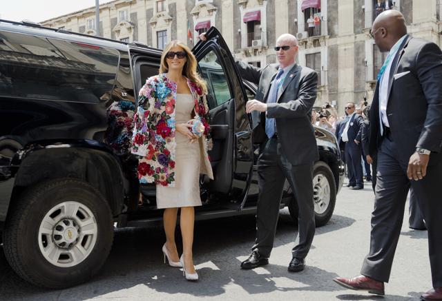 Melania Trump wore a Dolce and Gabbana multi-coloured floral coat at the City Hall, Palazzo degli Elefanti, in the Sicilian town of Catania, Italy, for a visit with some of the G7 leaders' partners on May 26, 2017. (AP) Melania Trump wore a Dolce and Gabbana multi-coloured floral coat at the City Hall, Palazzo degli Elefanti, in the Sicilian town of Catania, Italy, for a visit with some of the G7 leaders' partners on May 26, 2017. (AP)