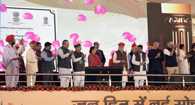 Prime Minister Narendra Modi marks the commencement of work of Rajasthan Refinery, in Barmer on Tuesday as Rajasthan chief minister Vasundhara Raje, Union petroleum minister Dharmendra Pradhan and other dignitaries look on. (PTI) Prime Minister Narendra Modi marks the commencement of work of Rajasthan Refinery, in Barmer on Tuesday as Rajasthan chief minister Vasundhara Raje, Union petroleum minister Dharmendra Pradhan and other dignitaries look on. (PTI)